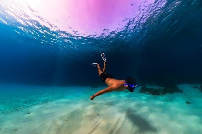 Swim and snorkel in the crystal-clear waters of Blue Lagoon and Comino on a private boat tour, stopping at hidden beaches and scenic coastal caves.