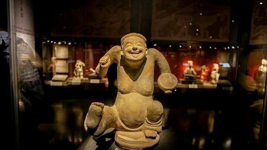 Pottery Singing and Dancing Figurine