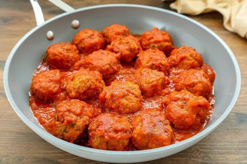 MEATBALLS WITH THE SAUCE ALWAYS COOKED WITH THE TOMATO OF FULLNOLO TYPICAL PRODUCTION OF THE TERRITORY OF THE VESUVIUS VOLCANO