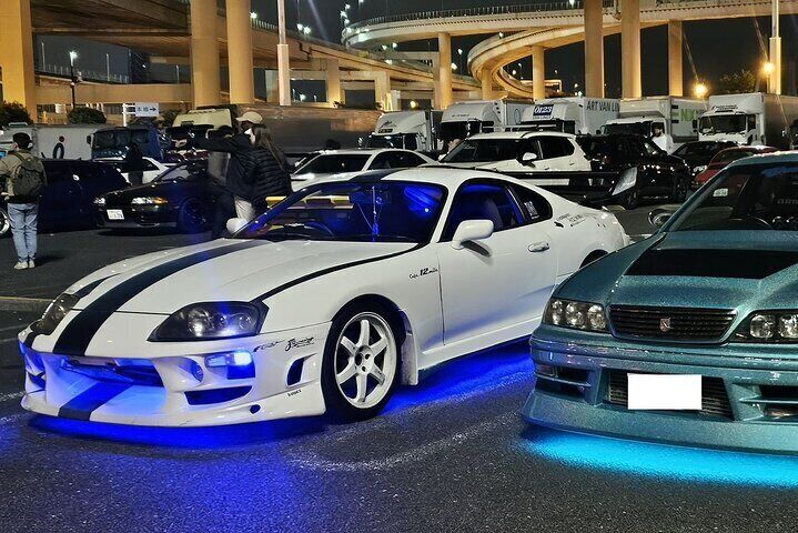 The Toyota dream team. Supra meets Mark II under the highway lights.