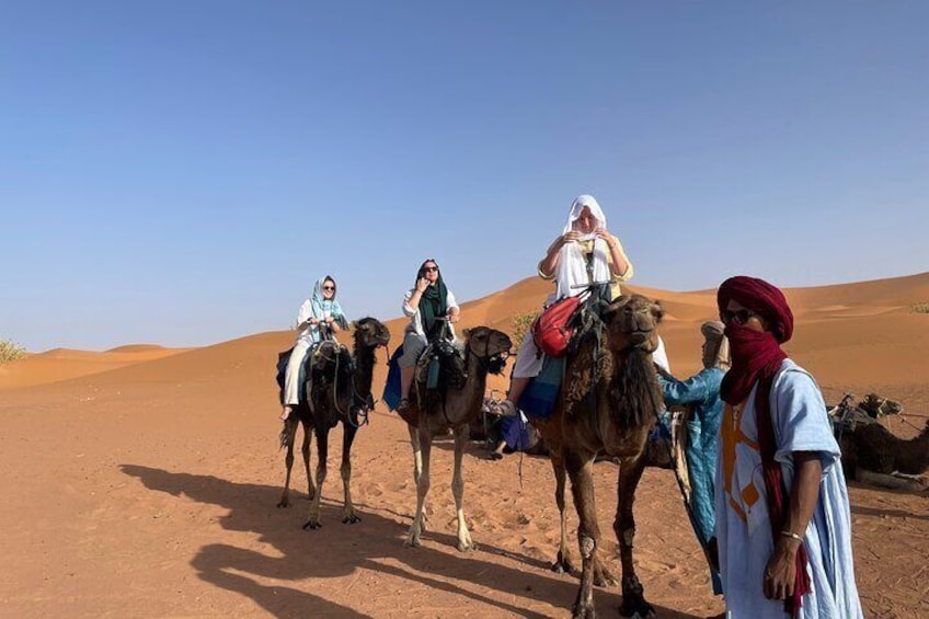 camel ride in sahara desert