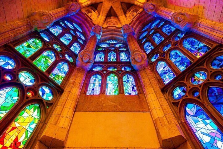 Lose yourself in the kaleidoscope of colors that flood the basilica—Sagrada Família’s stained glass transforms sunlight into a celestial work of art.