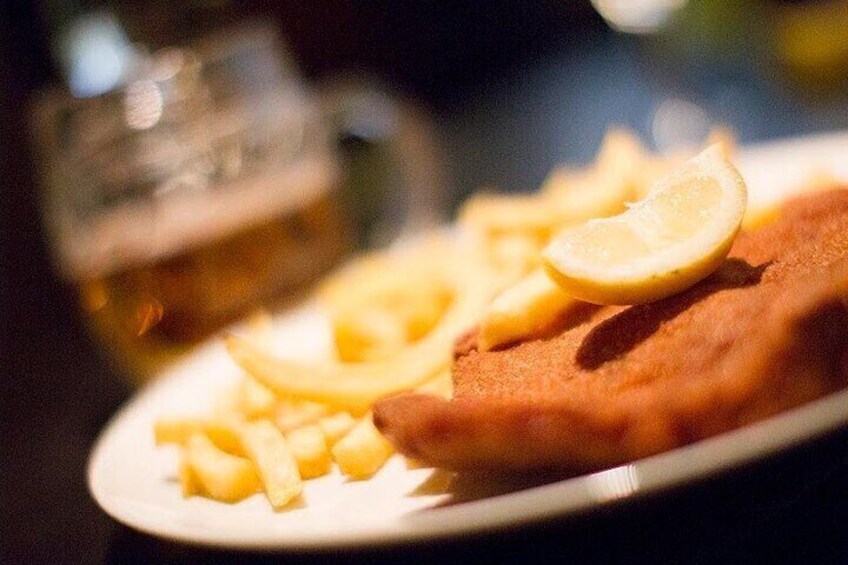 Imagine sinking your fork into a golden, crispy crust, as delicate as a tender embrace. The Wiener Schnitzel, Vienna’s iconic dish, is more than just a meal – it’s an experience that invites nostalgia