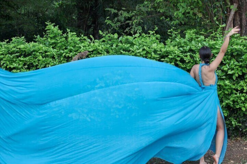 Nature's Embrace: A peaceful session surrounded by Costa Rica’s lush natural beauty, with the sky blue flying dress adding a touch of magic to the tranquil environment.