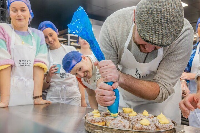 Join a hands-on bakery class, learning how to make London's Famed Creme Brulee Donuts!