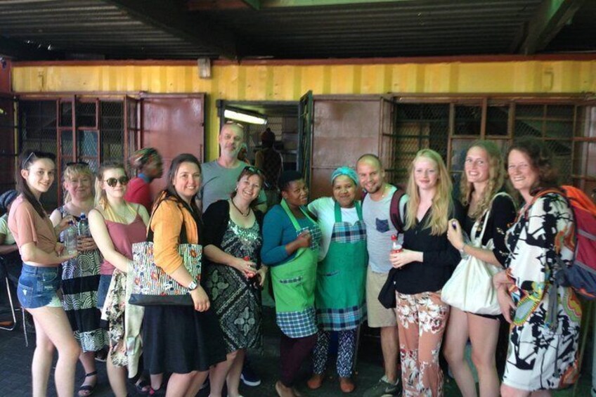 Guests in front of a local eatery