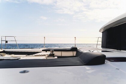 Mykonos Catamaran Sunset Cruise with Meal, Drinks & Transfer