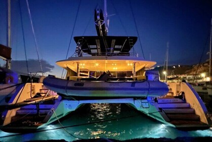 Mykonos Catamaran Sunset Cruise with Meal, Drinks & Transfer
