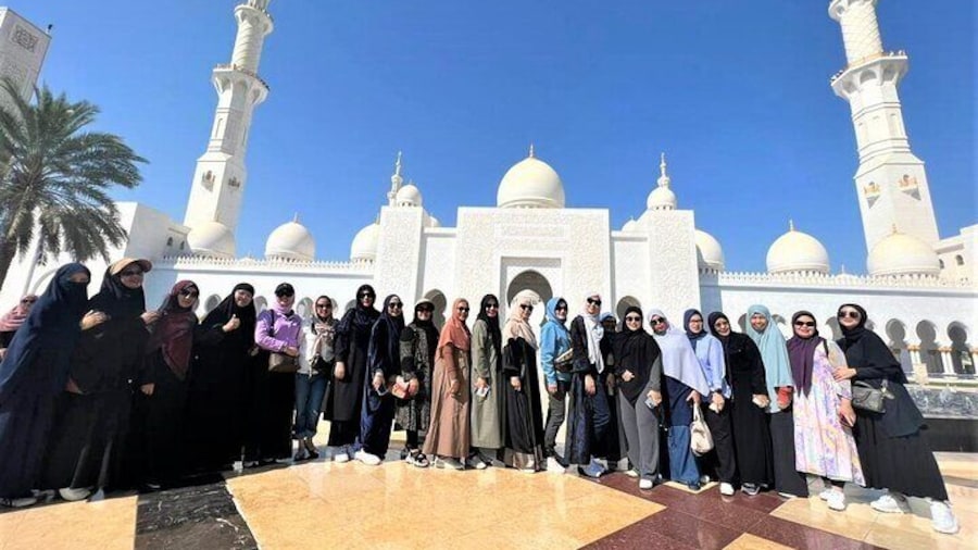 Sheikh Zayed Grand Mosque, Abu Dhabi: A stunning architectural masterpiece, renowned for its grandeur, intricate designs, and spiritual significance.