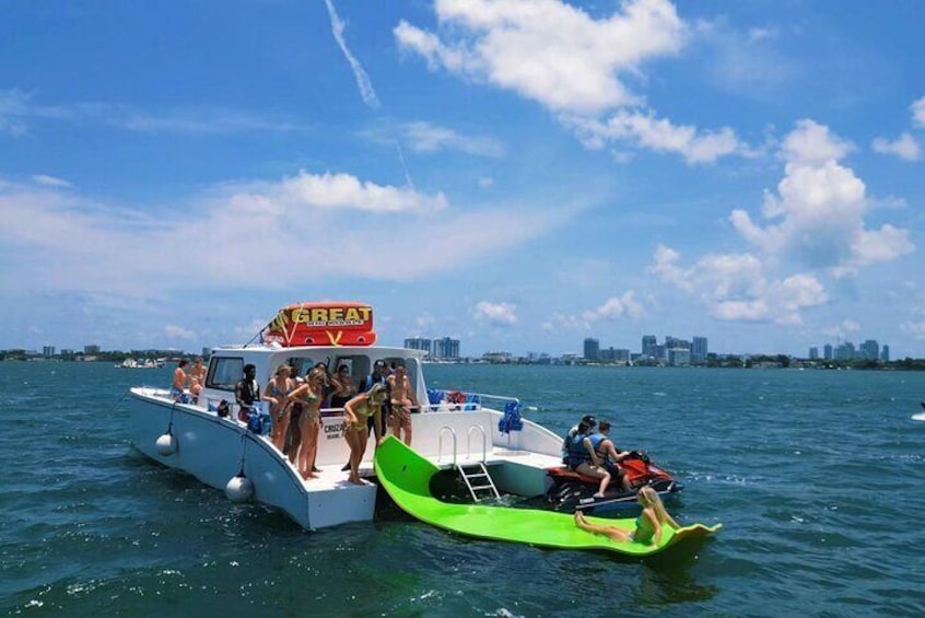 Relax in our floating mat of ride a jet ski and speed the waves in the Biscayne bay