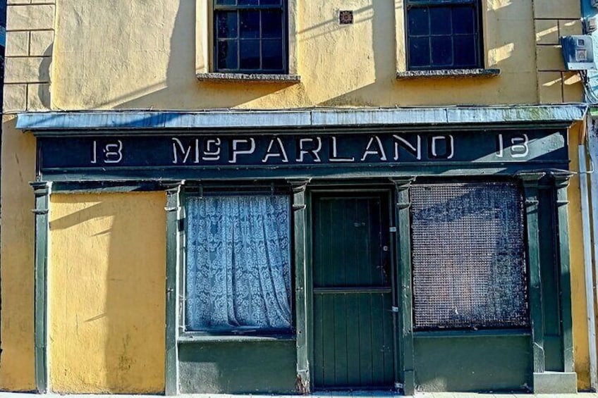 Old McParland wooden building shop-front.