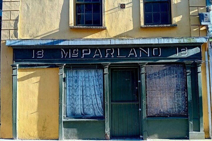 Old McParland wooden building shop-front.
