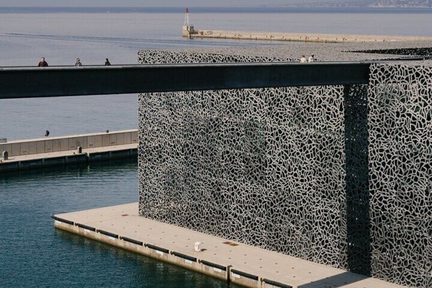 Photography of concrete mesh credited to: © Architects Rudy Ricciotti and Roland Carta / Mucem.