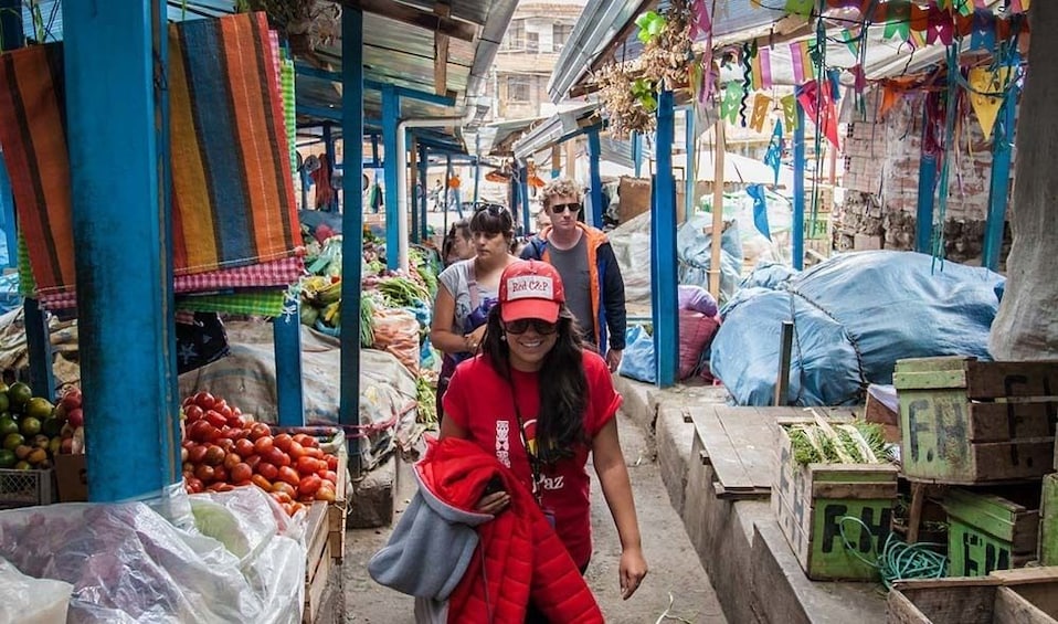 Tour group at a market in La Paz