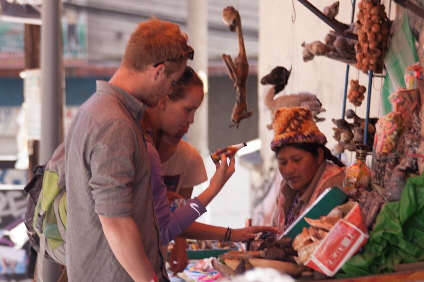 Tour group at a market in La Paz