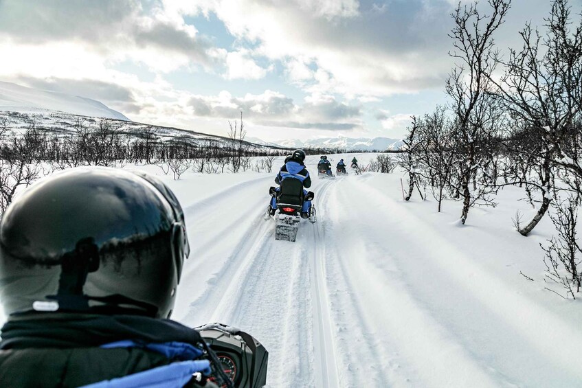 Picture 1 for Activity Lyngen: Snowmobile Safari with Lunch in seaside Restaurant