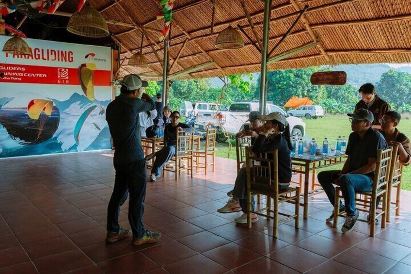 Tour guide provides information about itinerary and safety rules