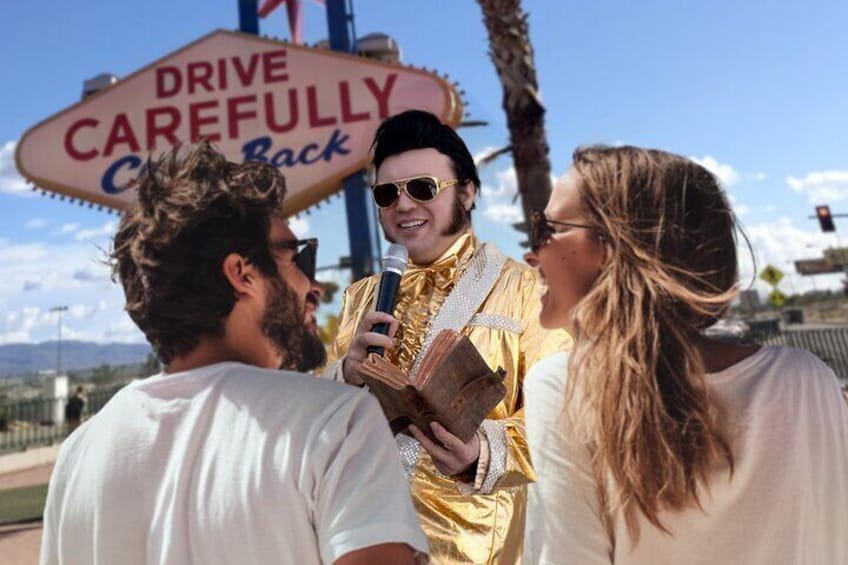 Gold Elvis Wedding or Vow Renewal at Las Vegas Sign