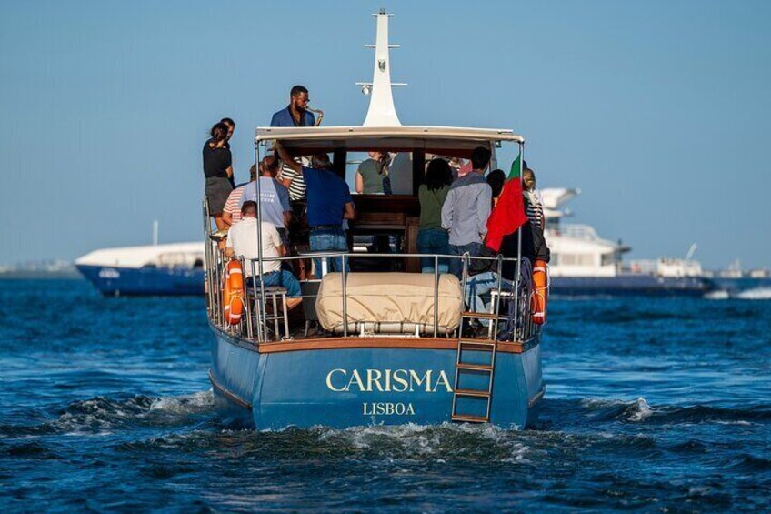 Classic Yacht Sunset group tour in Lisbon with welcome drink
