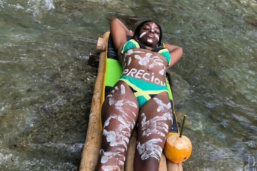 Getting that line stone massage while bamboo rafting 