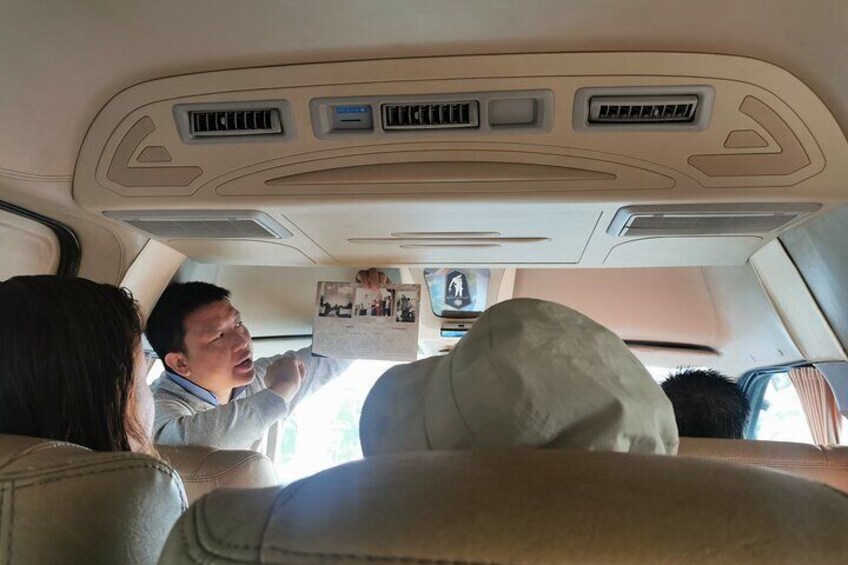 Our guide is explaining information to our travellers