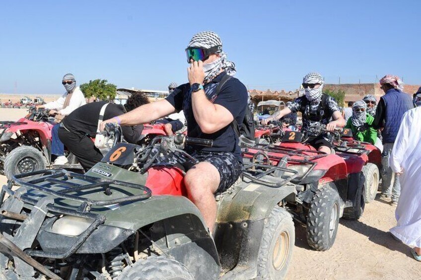 "Makadi Desert Safari: Quad Bike Ride, Camel Ride & Sea Caves Adventure with Hotel Pickup