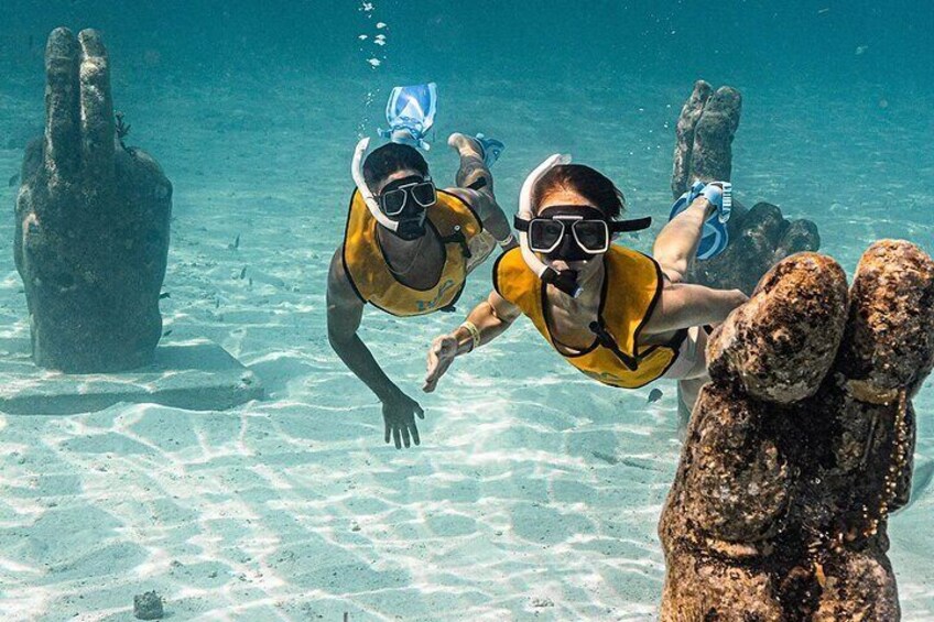 Catamaran Plus Reef Snorkeling and Isla Mujeres Visit