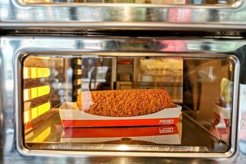 Croquette eating Who Is Amsterdam de Pijp Private Food tour
