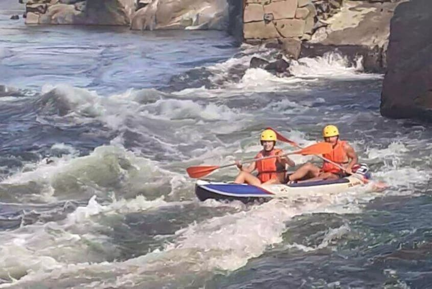 Canoeing on a rapid