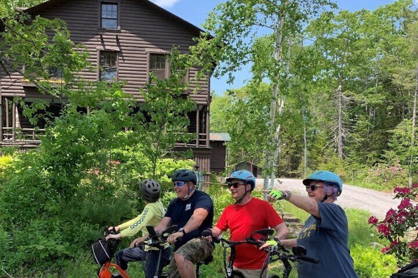 Tour Sprucewold - a historic log cabin village built in the 1920s.