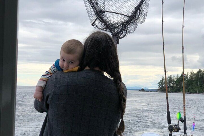 Two of Captain Jack's regulars (his wife and son) take in the views while we move between fishing spots.
