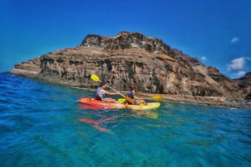 Kayak around the Mogan Caves and Cliffs