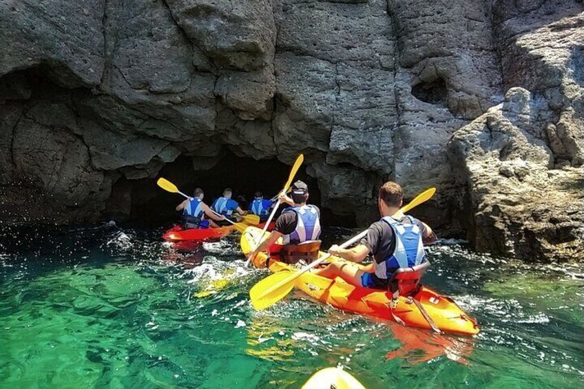 Kayak around the Mogan Caves and Cliffs