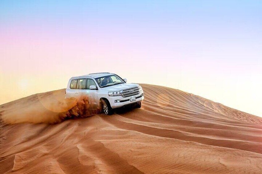 Dubai Desert Tour with Red Dunes Quad Bike Live BBQ