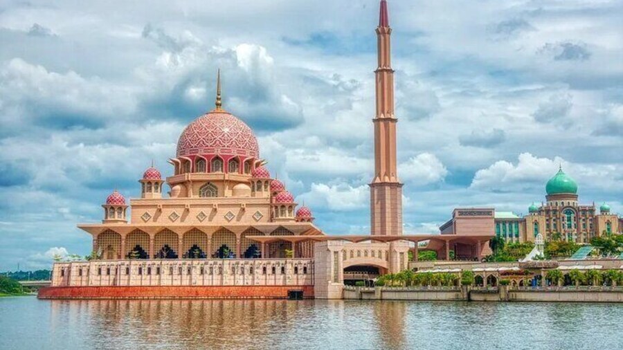 The pink-domed Putra Mosque is constructed with rose-tinted granite and consists of three main functional areas – the prayer hall, the Sahn, or courtyard.