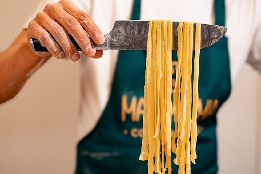 Authentic Pasta and Tiramisu with Unlimited Wine in Florence