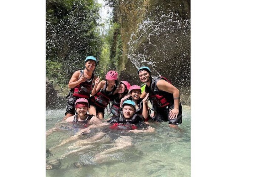 A group full of adrenaline and smiles—enjoying every jump and slide on our unforgettable canyoneering adventure!