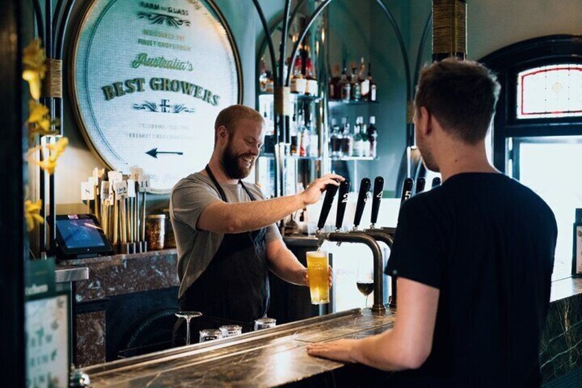 Pouring a beer at one of Sydney's microbreweries.