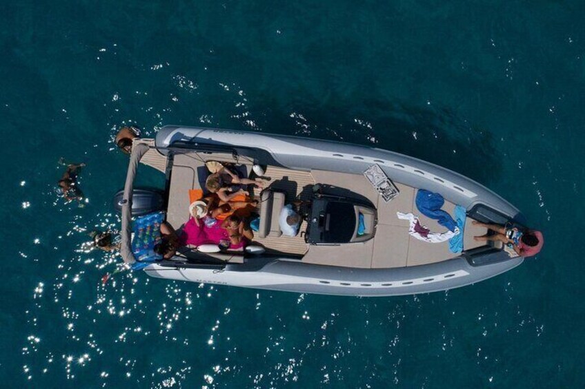 Boat party in Mondello by Night at Sunset with drinks and snacks