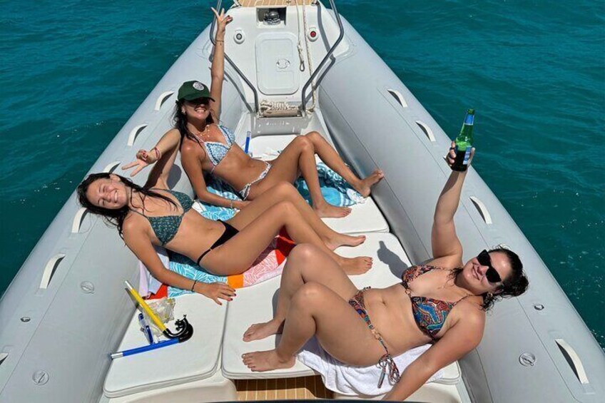 Boat party in Mondello by Night at Sunset with drinks and snacks