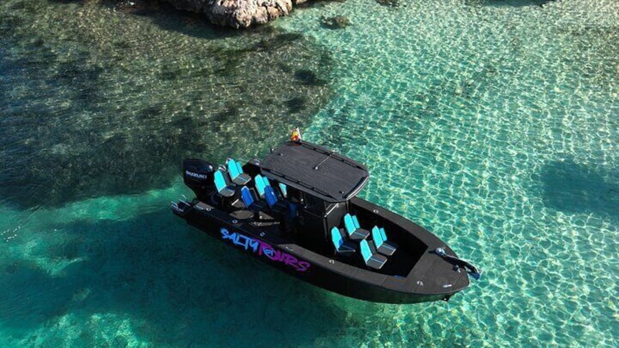 Palma Bay Boat Tour with Snorkeling and Paddle Surfing