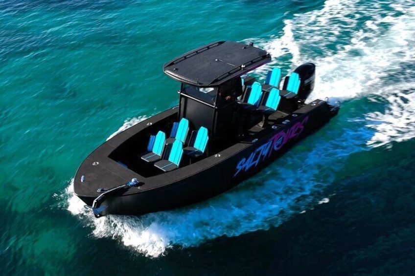 Palma Bay Boat Tour with Snorkeling and Paddle Surfing