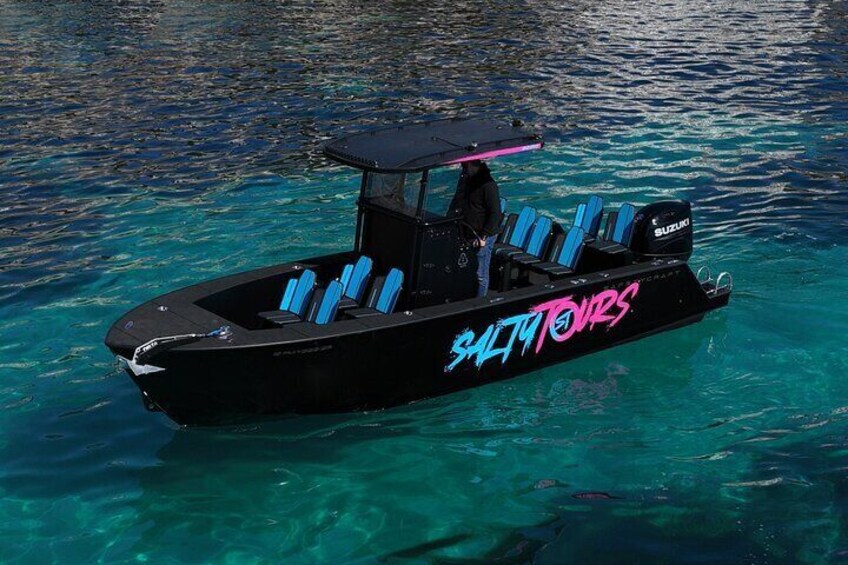 Palma Bay Boat Tour with Snorkeling and Paddle Surfing