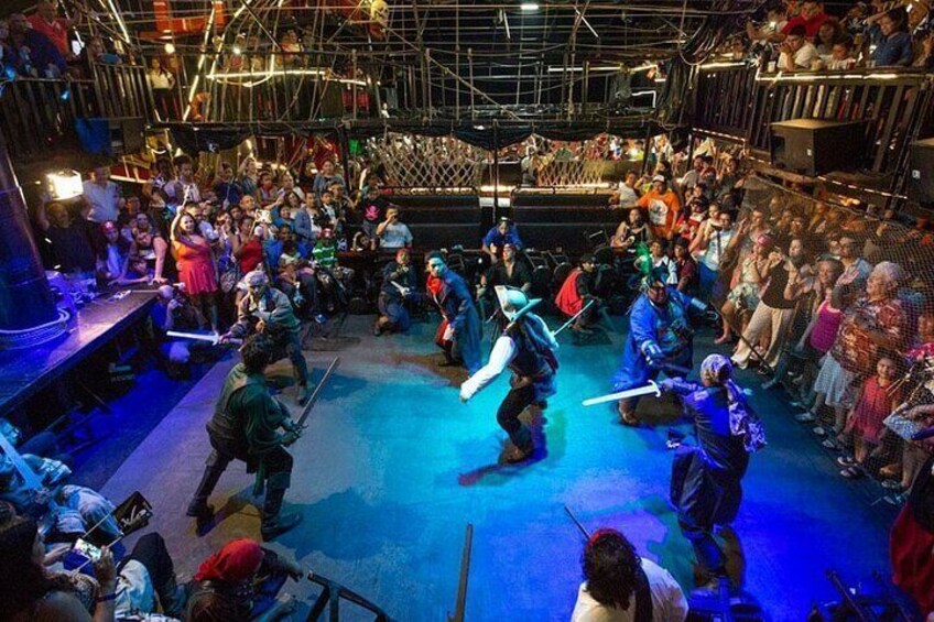 Dinner and show pirate night with Hook in Cancun 