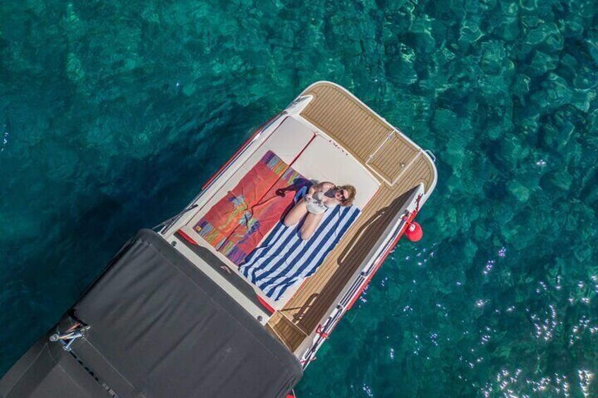 “Our speedboats offer spacious comfort, with shaded seating areas and a large sun deck at the stern for relaxing in the sun or shade.”