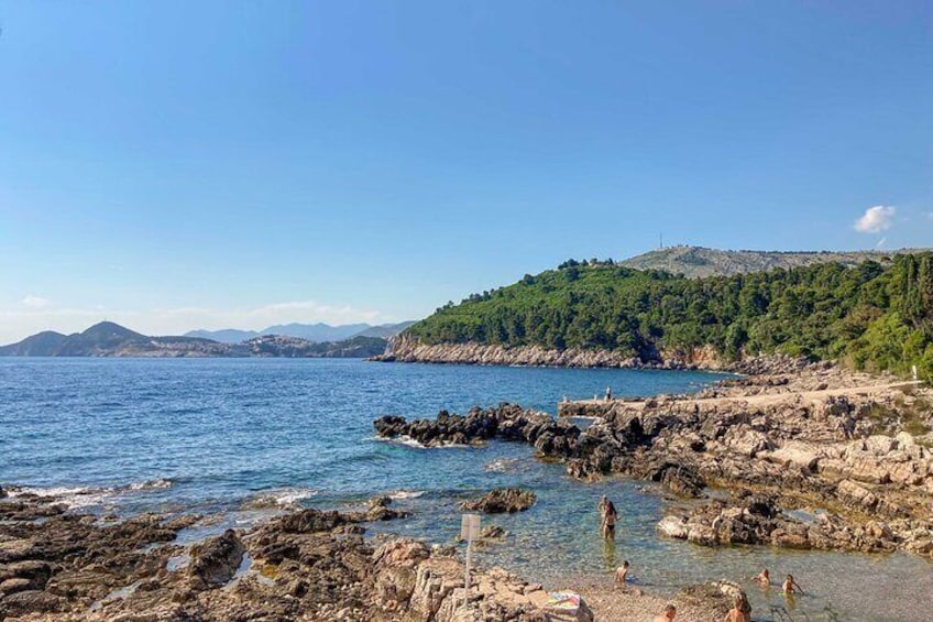 “Take a break and dive into the clear blue waters at our Lokrum swimming stop.”