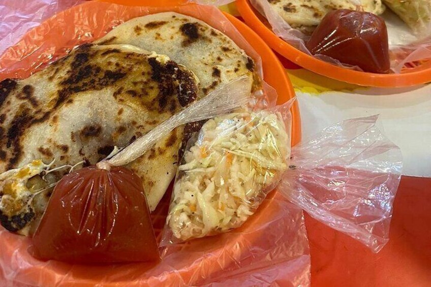 Of course we will try out the most known typical food we have in our country: Las pupusas