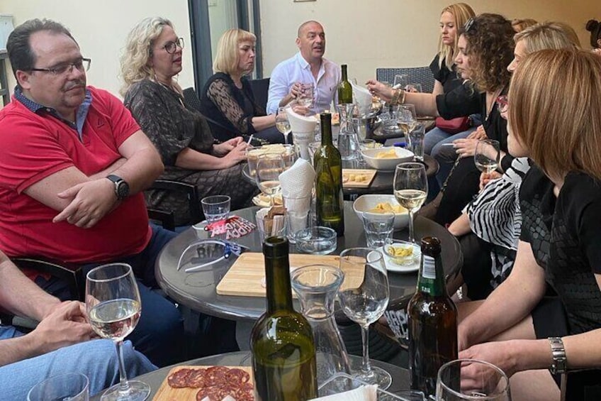 Our guests enjoying a relaxing moment, tasting local wines and savoring delicious finger food. A perfect way to immerse yourself in the flavors and atmosphere of Rijeka on our Food Tour!