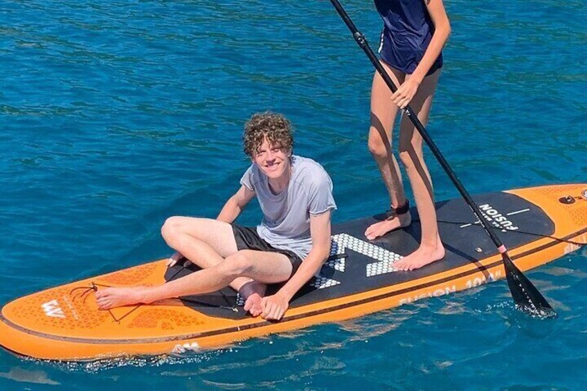 Exclusive catamaran sailing 3 hours dolphin drinks swim stop