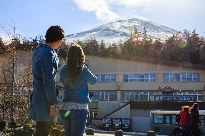 Tourists enjoying scenic views of Mt. Fuji in Japan 